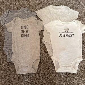 Carter’s Baby Onesies – Lot of 4 – 0–3 Months – Gender Neutral